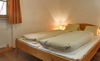 Komfortable Schlafzimmer in den Ast'n Hütten im Salzburger Land