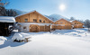 Genießen Sie die Sonnenstunden im Winter in den Chalets Lehenriedl im Salzburger Land