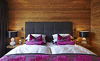Komfortables Kingsize-Bett für Ihren Romantikurlaub im Chalet F